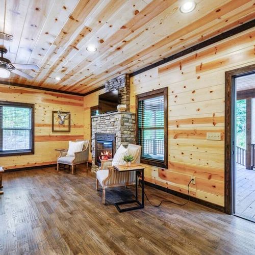 The Master has additional seating around the fireplace and direct patio access