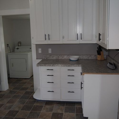 Kitchen:  the home has a huge kitchen that is complete with all modern appliances, including a dishwasher. A good supply of cooking and dining utensils are included as well.