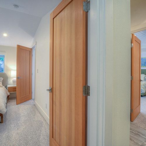 Both large bedrooms have a private entrance but share one full bathroom.