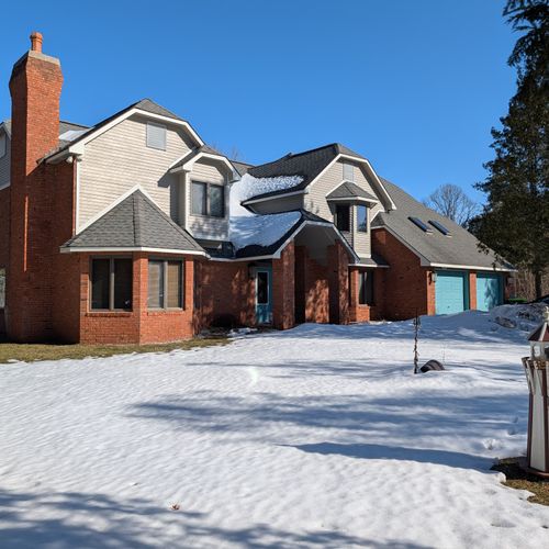 OVERVIEW:  The front of the home in winter.