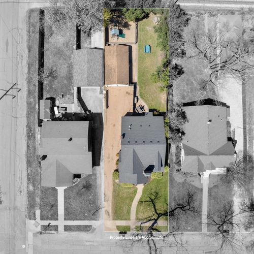 Aerial View of Property with Parking
