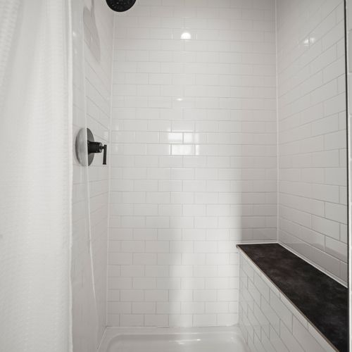 Shower in style with the modern finishes of the fully remodeled en suite bathroom.