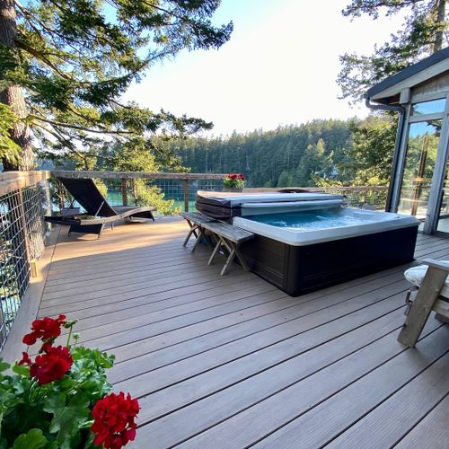 Four-person hot tub and lounge area