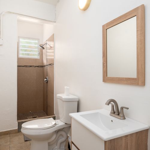 Clean, modern vanity and sink area.