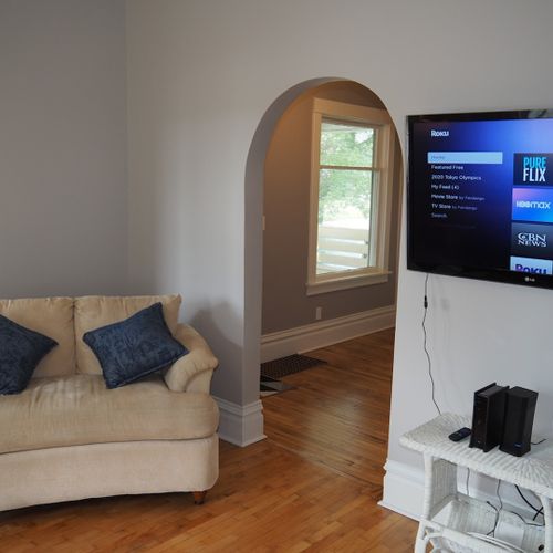 Living room:  the house has a beautifully remodeled and comfy living room that is great for relaxing! The large flat screen television includes streaming services with pureflix, netflix, disney+, and hbo max all included!