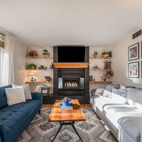 Welcome to your newly redecorated modern cowboy cottage. Relax in the heart of the home, our cozy living room with chic country decor. Kindly note the fireplace is not in use due to safety purposes.