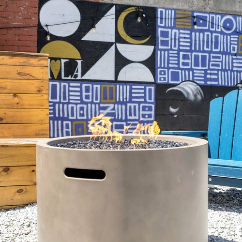 Cozy firepit nook perfect for winding down after a day out in the city.