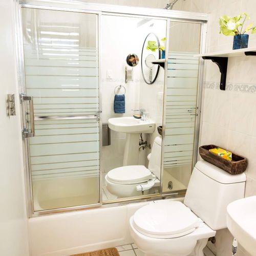 Our bright and practical bathroom offers everything you need, including a convenient shower, a clean vanity, and a welcoming atmosphere to refresh after your adventures.