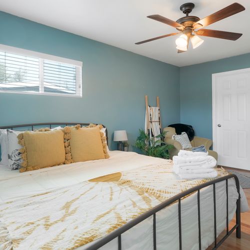 Kick back in the master bedroom, complete with a king-sized bed and walk-in closet.