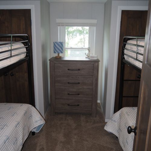 Bedroom #5 (second floor):  has two twin-on-twin bunk beds, thus sleeping four people.