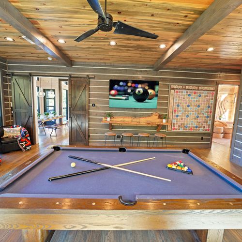 Family fun starts here in the cozy-cool game room designed to keep the fun going no matter the weather.