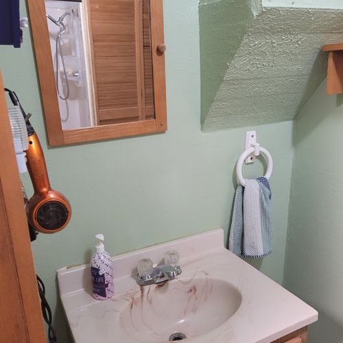 Bathroom:  the sink with the mirror above