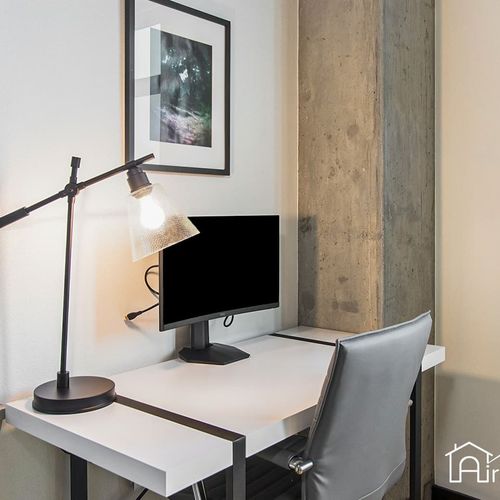 - stay productive with a sleek workstation featuring a desk lamp and monitor
- tucked into a quiet nook with natural light and modern industrial accents
- ideal setup for remote work, study sessions, or creative inspiration