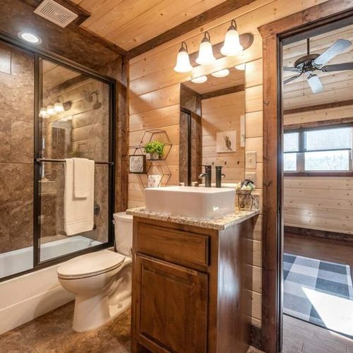 Shared bathroom with tub/shower.