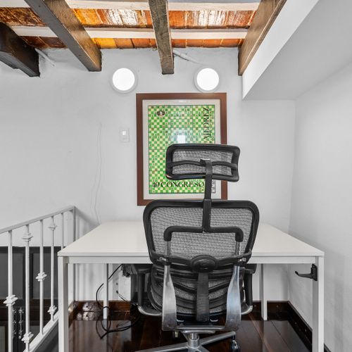 Productive space: Simple desk setup in a bright, quiet corner.