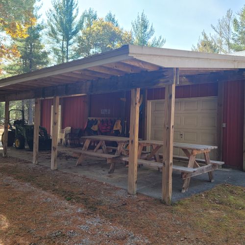 Exterior:  the covered picnic table area next to the detached garage.