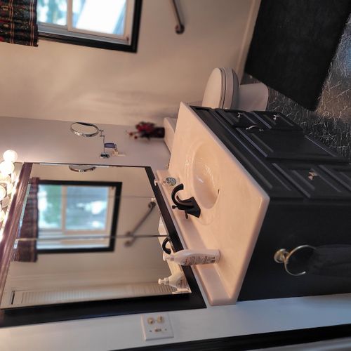 Bathroom #2 (second floor):  large and gorgeous bathroom with a soaking tub, walk-in shower, ceiling fan, mirror, vanity, sink, and a toilet with a bidet.