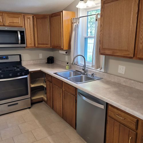 Kitchen:  the home has a fairly large kitchen with all appliances including a dishwasher. Also has a good supply of cooking and dining utensils.
