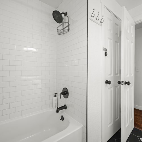 Spa-like bathroom design featuring a soothing shower tub combo.