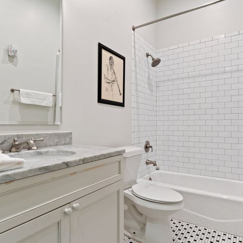 Full bathroom space with shampoo, conditioner, body wash, and hand soap provided | Bathroom 1