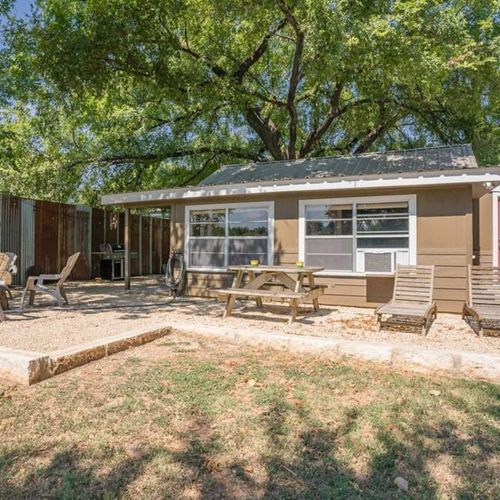 Enjoy the outdoor spaces by the cabin and the Airstream all overlooking the river