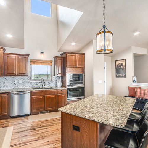 Cook, connect, and unwind in this cozy-modern hub.