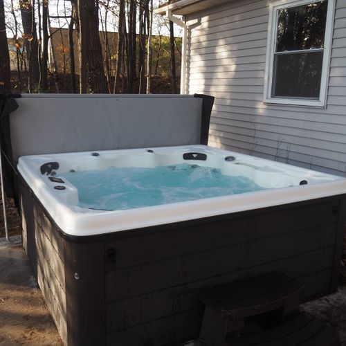 Exterior:  the new year-round hot tub in the backyard.