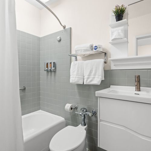 Start your day refreshed in a clean, modern bathroom with premium amenities.