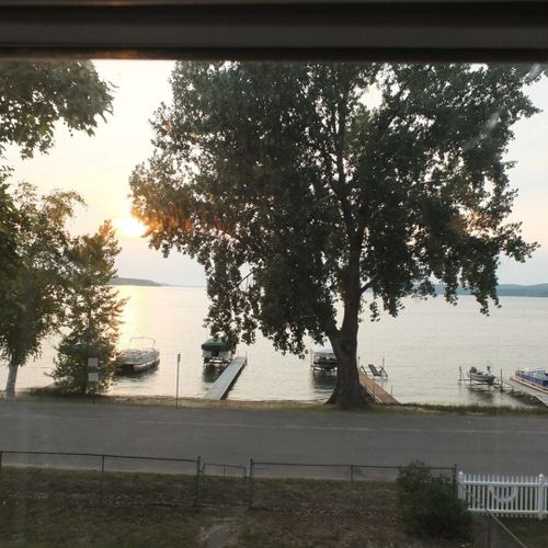 Porch:  the cottage has a huge wrap-around porch that is fully enclosed and has great views of crystal lake!