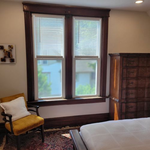 Bedroom #5 (second floor):  features a queen-size bed, dresser, 2 chairs, 2 lamps, and a closet.