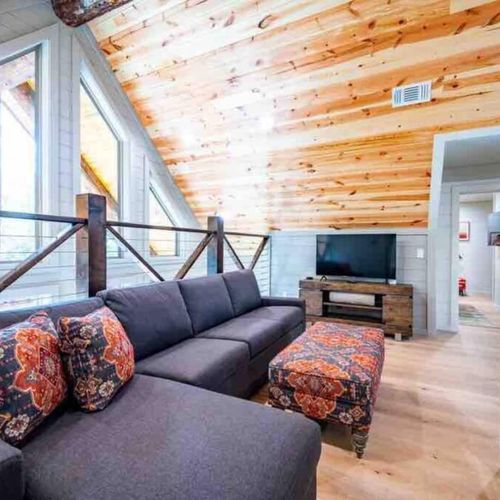 The loft area with a King Tempur-Pedic sleeper sofa!