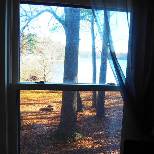 Bedroom #2 (main floor):  includes a futon, workstation (desk, chair, and monitor), ceiling fan, closet, and another lovely lake view!