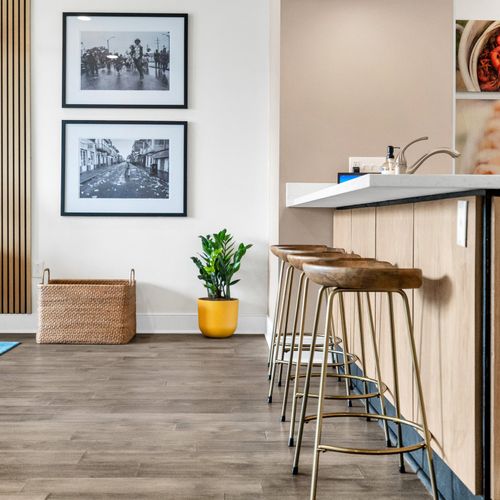 Sleek kitchen with a breakfast bar and modern amenities.