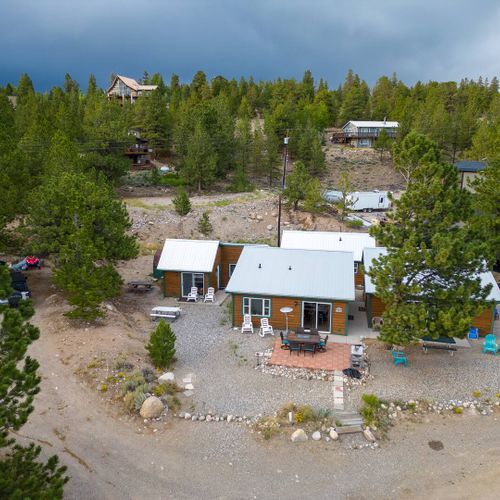 Experience cabin life among the evergreens at twin lakes, colorado.
