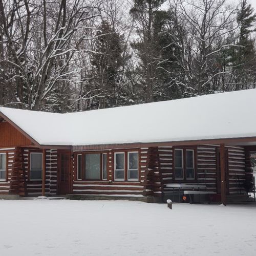 Overall:  the front of the cabin in winter