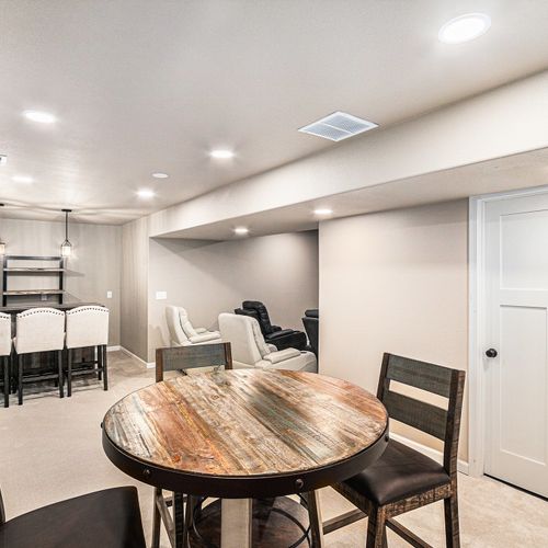Carpeted throughout with soft tones and layered lighting—ideal for downtime.