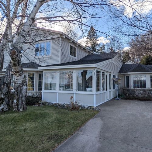 Exterior:  the driveway and the enclosed front porch.