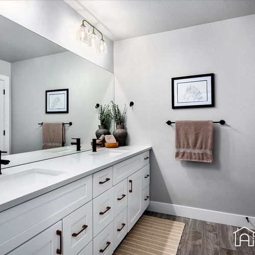 Pamper yourself in this master bathroom with a walk-in shower and plenty of storage space.