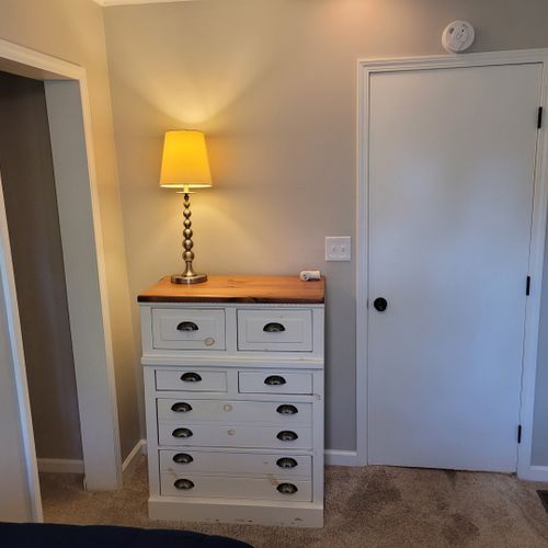 Bedroom #2:   features 2 twin beds, ceiling fan, dresser, closet, and a lamp.