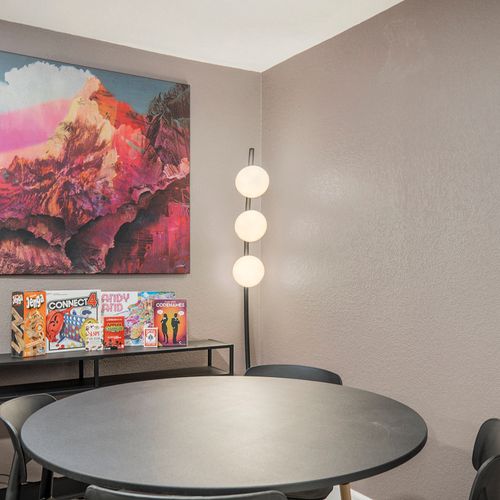 Enjoy a fun-filled game night at the game table, complete with a selection of provided board games for endless entertainment!