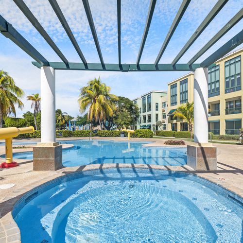 Lounge by the sparkling pool and cool off on a hot tropical day.