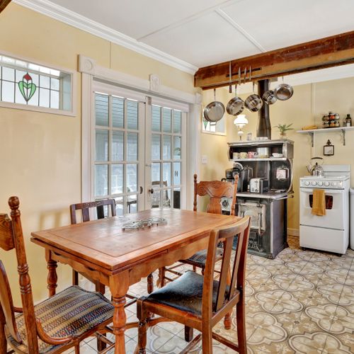 Rustic charm meets function in this kitchen stocked with pans and essentials.