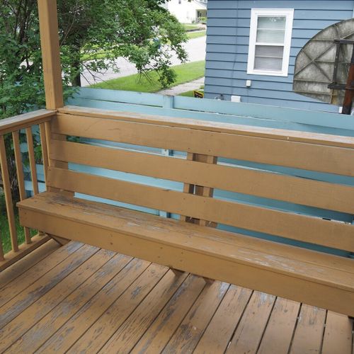 Exterior:  the house has a charming little bench on the front porch.