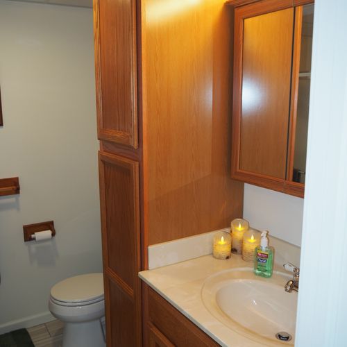 Bathroom:  full bathroom with a walk-in shower as well as a stacked washer and dryer.