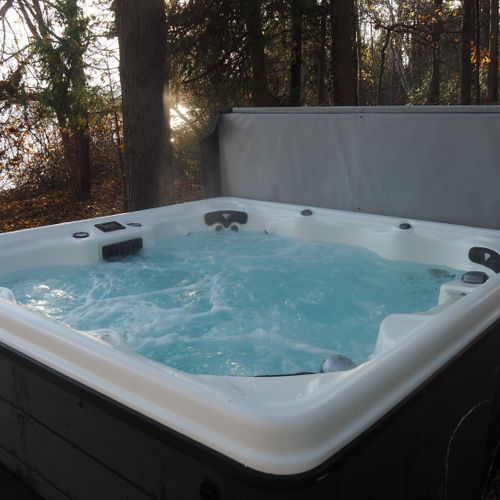Exterior:  the new year-round hot tub in the backyard.