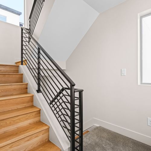 Well-kept stairway between floors.