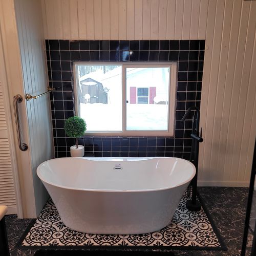 Bathroom #2 (second floor):  large and gorgeous bathroom with a soaking tub, walk-in shower, ceiling fan, mirror, vanity, sink, and a toilet with a bidet.