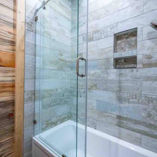 The bunk bathroom has a shower/tub combo.