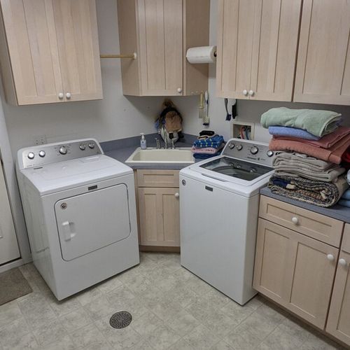 Laundry room (first floor):  there is a large laundry room on the first floor that also conveniently has its own entrance (particularly for kids coming in from swimming ;-).