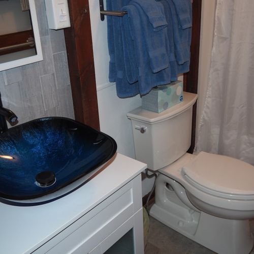Bathroom:  the cottage has a full bathroom, which includes a combination tub and shower.